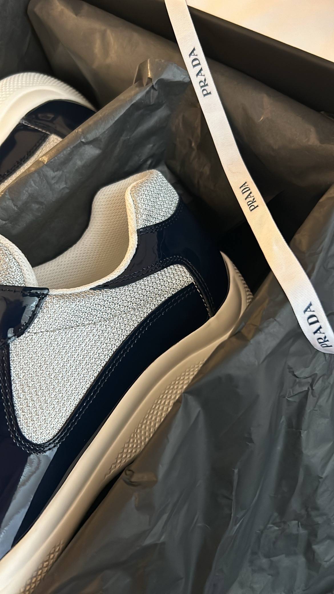 P Trainers in Patent Blue